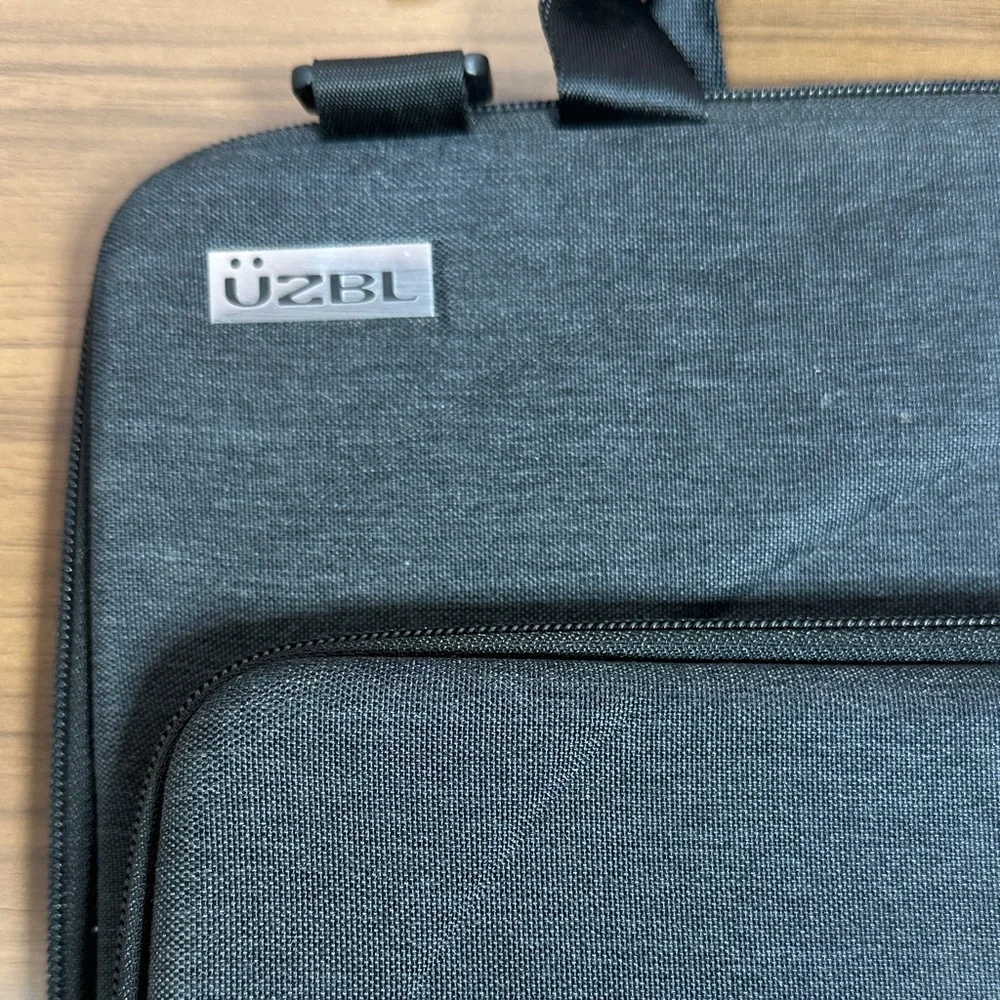 Universal Black Laptop Carrying Case with Handle and Front Pocket
